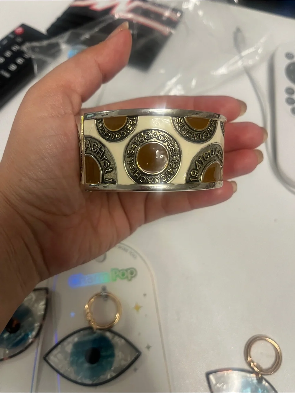 Cream colored coach bracelet - Picture 2 of 3